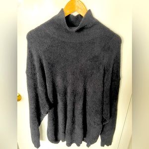 Aritzia Hush Knit Turtleneck. Black. Size L.